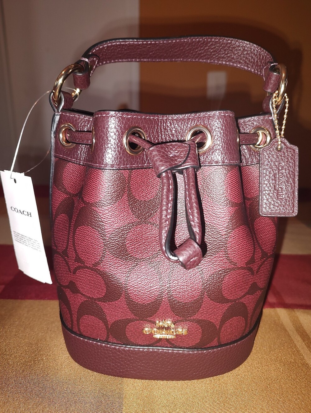 Signature Coach Dome Shoulder Bag in Oxblood Multi